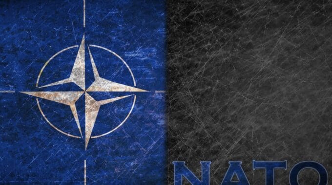 Old Metal Background With NATO Flag