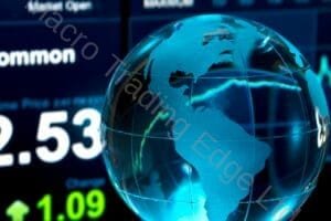 Glass Globe over Stock Data on Computer Screen