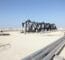 Black oil pump jacks in the desert of Bahrain, Middle East