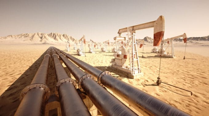 Oil Pipelines And Rigs In Desert