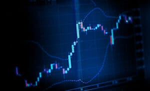 stock exchange chart graph blue toned on computer screen Stock Exchange Chart Graph in Blue Tone